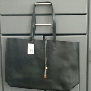 Black tote with detachable wristlet